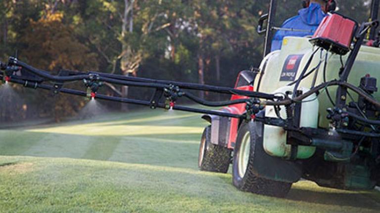 Spraying turf